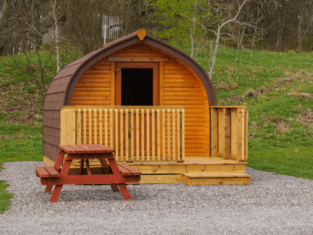 A cozy wooden glamping cabin.